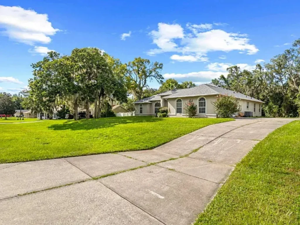 full road side view for Modern Finishes and Fenced Yard in Central Ocala